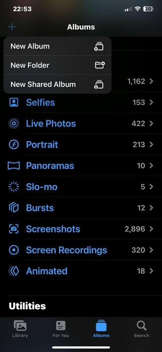 iPhoneで「新しい共有アルバム | 写真に場所を追加」をタップ